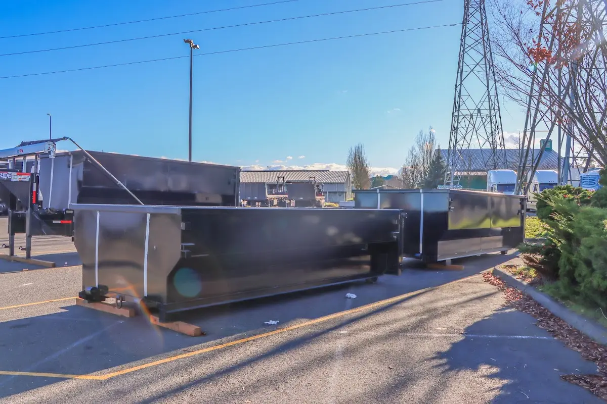 Roll-off dumpster ready for waste disposal at job site for Yard Waste Dumpster Rental in Mayfield